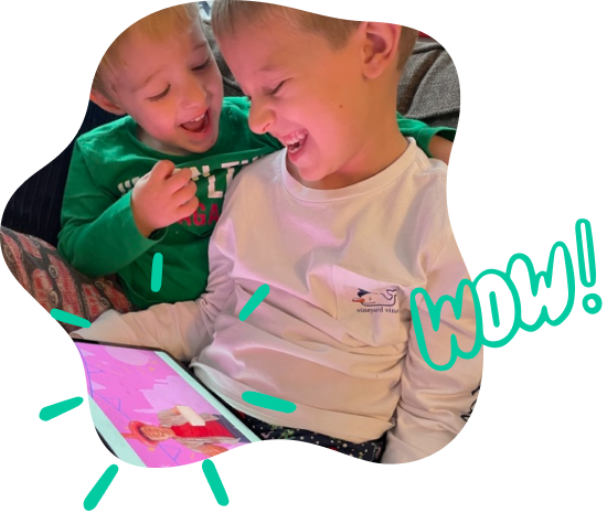 Two kids enjoying The Birthday Show on the Hellosaurus iPad app